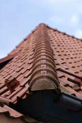 Naklejka premium Tiles on a roof. Corner line