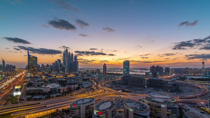 Dubai Media City with Modern buildings aerial day to night timelapse, United Arab Emirates
