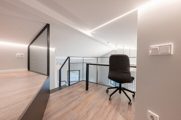 Modern Home Office Loft With Ergonomic Chair and Sleek Interior Design Features