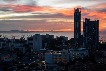 Sunset view from the 22nd floor of a condominium in Pattaya town Chonburi district Thailand Asia