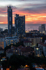 Sunset view from the 22nd floor of a condominium in Pattaya town Chonburi district Thailand Asia