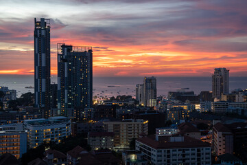 Sunset view from the 22nd floor of a condominium in Pattaya town Chonburi district Thailand Asia