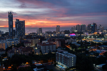 Sunset view from the 22nd floor of a condominium in Pattaya town Chonburi district Thailand Asia