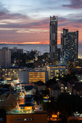 Sunset view from the 22nd floor of a condominium in Pattaya town Chonburi district Thailand Asia