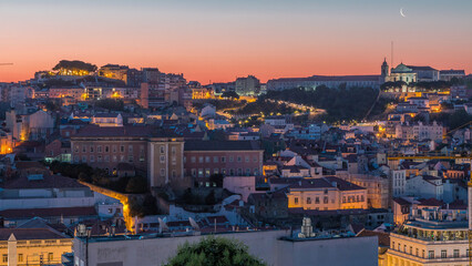 Obraz premium Lisbon aerial cityscape skyline night to day timelapse from viewpoint of St. Peter of Alcantara, Portugal