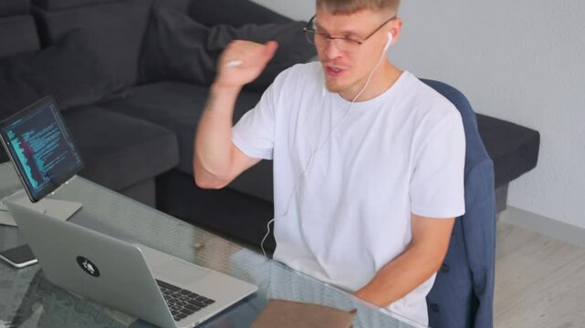 Tutor explains material on video call, encouraging student success.