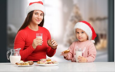 Portrait of happy young family celebrating Christmas