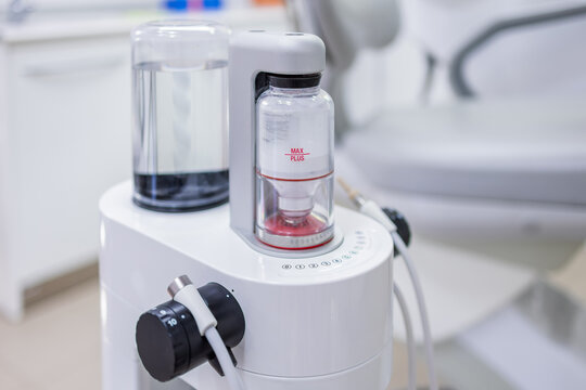 Dental Air Flow system for oral hygiene, featuring a powder and water container, designed for cleaning and whitening teeth with precision