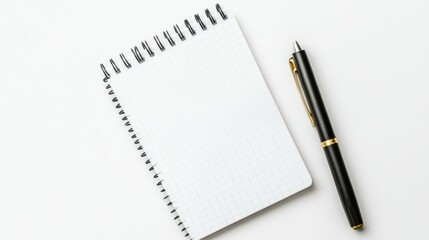 Fototapeta premium Blank notepad and pen on a white isolated background
