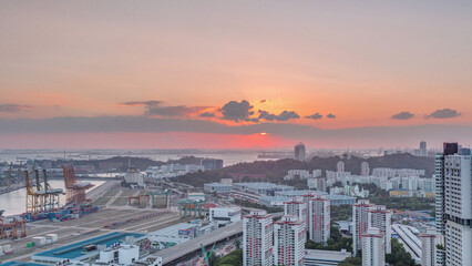 Sunset over commercial port of Singapore timelapse.
