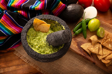 Guacamole. Avocado dip sauce, one of its many ways of consuming it is spread on tortilla chips also called Nachos. Mexican easy homemade sauce recipe very popular.