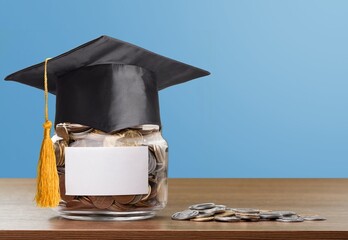 Saving for Investments, jar of coins on the desk