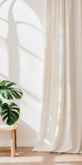 Indoor palm plant in woven basket by window with sheer curtains, background