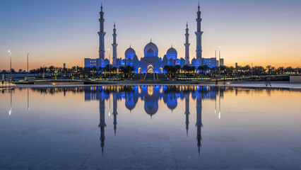 Sheikh Zayed Grand Mosque in Abu Dhabi day to night timelapse after sunset, UAE