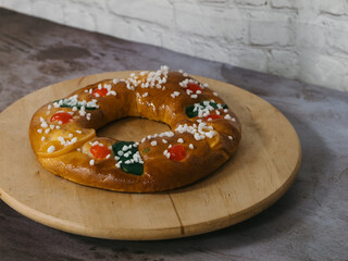 typical spanish christmas cake roscón de reyes on a plate