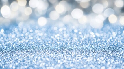 Fototapeta premium Shimmering Blue Glitter Background with Soft Bokeh Effect