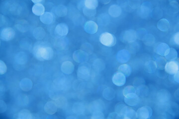 Abstract background of blue bokeh lights