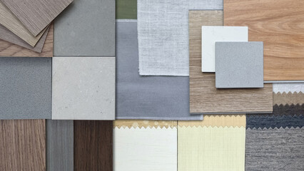 collection of interior design material samples, including various wood veneers, fabric swatches,...