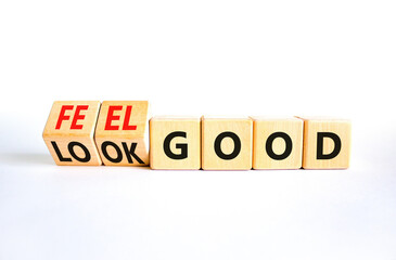 Look and feel good symbol. Concept words Look good Feel good on wooden cubes. Beautiful white table...