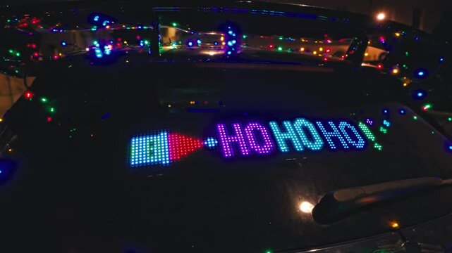 Festive LED light sign with colorful holiday message