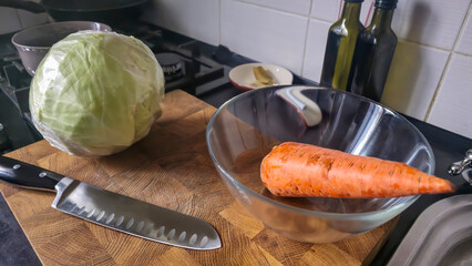 Cabbage and carrot dish at home in the kitchen. Step-by-step instructions