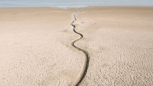 Land emerged in the Basentello dam lake during a period of extreme drought that is affecting southern Italy due to high temperatures and low rainfall. Matera - Basilicata - Italy -