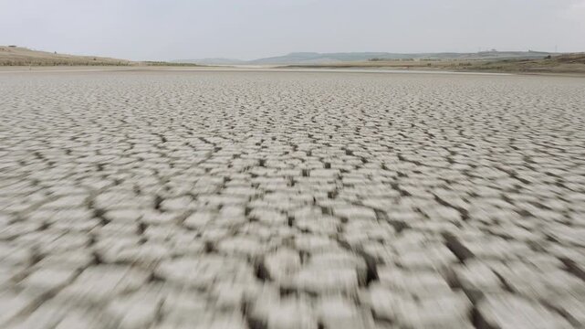 Land emerged in the Basentello dam lake during a period of extreme drought that is affecting southern Italy due to high temperatures and low rainfall. Matera - Basilicata - Italy -