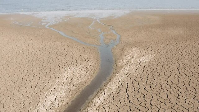 Land emerged in the Basentello dam lake during a period of extreme drought that is affecting southern Italy due to high temperatures and low rainfall. Matera - Basilicata - Italy -
