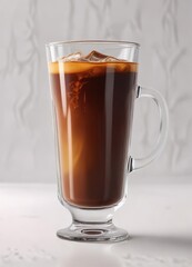 Rich brown coffee liquid in a tall clear glass cup on a white background , isolated, cup