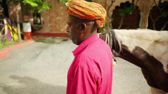 Tribal old person giving steed ride services