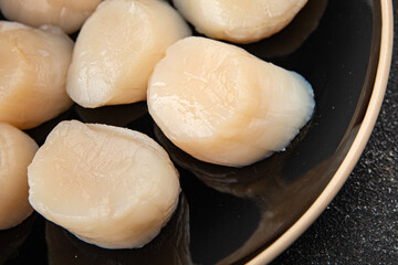 Raw sea scallop seafood fresh tasty food dish delicious gourmet food background on the table rustic food top view copy space keto and paleo diet vegetarian  food pescetarian diet