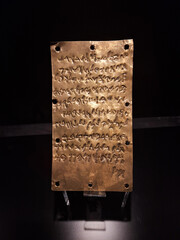 Phoenician Golden Plate in the museum. The Pyrgi Tablet. Phoenician alphabet.
