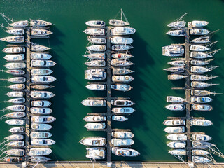 Aerial view of a marina with anchored yachts