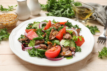 Delicious fresh tuna salad served on wooden table