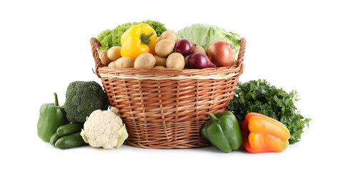 Different ripe vegetables in wicker basket isolated on white