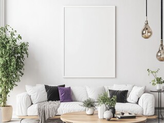 White sofa, plants, and large frame in minimalist living room.