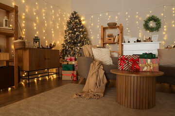 Stylish interior of modern living room with Christmas tree and gifts on wooden table