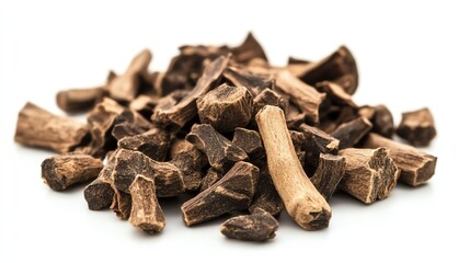Fototapeta premium Dried medicinal herb roots displayed on a white background.