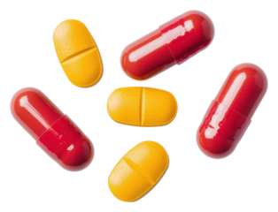 PNG Colorful capsules in red and yellow arranged in a dynamic composition.