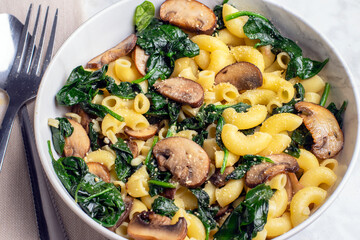 macaroni with  spinach,  and mushrooms