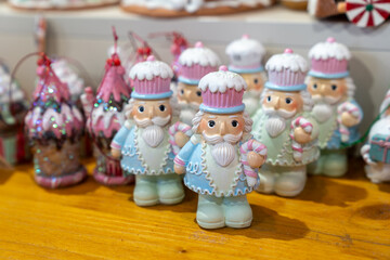 Pastel colored nutcracker style Christmas decorations sold at Christmas market - Strasbourg France