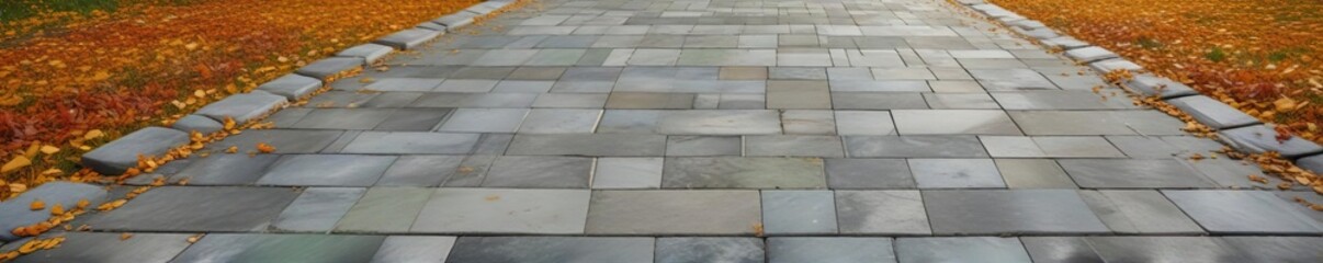 Small stone scattered gray pavement under a European autumn sky with greenish tinted background, small stones, wet, europe