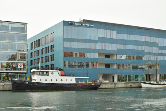 Malmo, Sweden. December 17, 2024. Malmo university view with a boat in a channel.