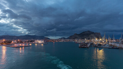 Aerial view of sea with waves and port from ship sailing in the open sea timelapse