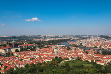 Aerial view of Prague seen from Petrin tower, Czechia. City's iconic landmarks, including Prague...