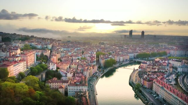 Lyon france city skyline aerial top view fly over river and old town in front skyscrapers lyon city centre drone footage.