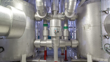 Equipment, cables and piping as found inside of industrial chiller plant room timelapse hyperlapse