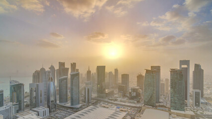 Skyscrapers at sunset timelapse in the skyline of commercial center of Doha, the capital Qatar