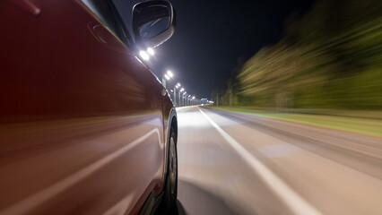 Obraz premium Drivelapse from Side of Car moving on a night highway timelapse hyperlapse