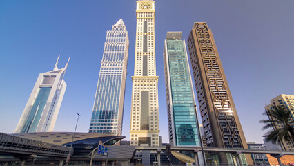 Obraz premium Skyscrapers at the Sheikh Zayed Road in Dubai timelapse hyperlapse